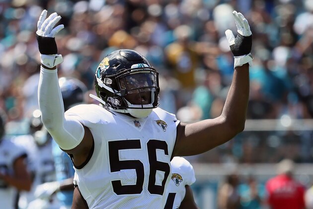 JACKSONVILLE, FL - SEPTEMBER 23:  Dante Fowler Jr. #56 of the Jacksonville Jaguars tries to rally the crowd against the Tennessee Titans at TIAA Bank Field on September 23, 2018 in Jacksonville, Florida.  (Photo by Frederick Breedon/Getty Images)
