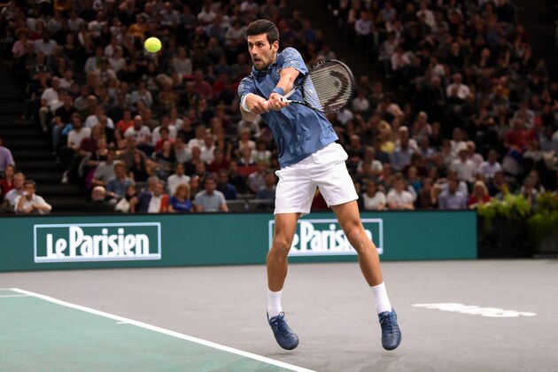 Serbia's Novak Djokovic returns the ball to Portugal's Joao Sousa during their men's singles second round match on day two of the ATP World Tour Masters 1000 - Rolex Paris Masters - indoor tennis tournament at The AccorHotels Arena in Paris, on October 30, 2018. (Photo by Anne-Christine POUJOULAT / AFP)        (Photo credit should read ANNE-CHRISTINE POUJOULAT/AFP/Getty Images)