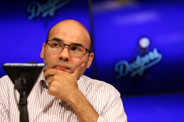 Dodger's General Manager Farhan Zaidi, listens during a news conference in Los Angeles on Thursday, Oct. 22, 2015. Don Mattingly won't return as manager of the Los Angeles Dodgers next year after agreeing with his bosses that he and the team needed a fresh start.  (AP Photo/Richard Vogel)