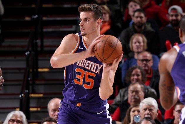 PORTLAND, OR - OCTOBER 10: Dragan Bender #35 of the Phoenix Suns handles the ball against the Portland Trail Blazers during a pre-season game on October 10, 2018 at Moda Center, in Portland, Oregon.  NOTE TO USER: User expressly acknowledges and agrees that, by downloading and/or using this Photograph, user is consenting to the terms and conditions of the Getty Images License Agreement. Mandatory Copyright Notice: Copyright 2018 NBAE (Photo by Sam Forencich/NBAE via Getty Images)