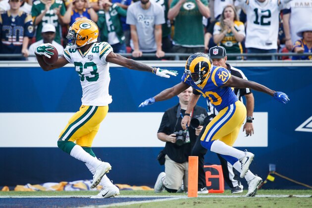 LOS ANGELES, CA - OCTOBER 28: Wide receiver Marquez Valdes-Scantling #83 of the Green Bay Packers scores a touchdown in the fourth quarter to take the lead against the Los Angeles Rams at Los Angeles Memorial Coliseum on October 28, 2018 in Los Angeles, California. (Photo by Joe Robbins/Getty Images)