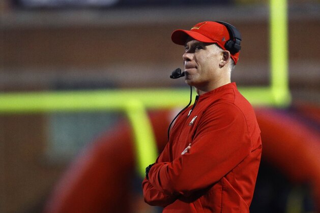 FILE - In this Nov. 25, 2017, file photo, Maryland head coach DJ Durkin watches the first half of an NCAA college football game against Penn State in College Park, Md. An external investigation of the Maryland football program under coach Durkin has determined that the team