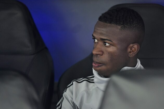 Real Madrid's Brazilian forward Vinicius Junior sits on the bench before the UEFA Champions League group G football match between Real Madrid CF and FC Viktoria Plzen at the Santiago Bernabeu stadium in Madrid on October 23, 2018. (Photo by JAVIER SORIANO / AFP)        (Photo credit should read JAVIER SORIANO/AFP/Getty Images)