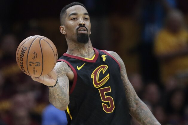 Cleveland Cavaliers' JR Smith (5) passes against the Boston Celtics in the second half of Game 4 of the NBA basketball Eastern Conference finals, Monday, May 21, 2018, in Cleveland. (AP Photo/Tony Dejak)