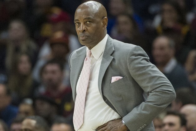 Cleveland Cavaliers interim head coach Larry Drew watches play against the Dallas Mavericks during the first half of an NBA basketball game in Cleveland, Sunday, April 1, 2018. (AP Photo/Phil Long)