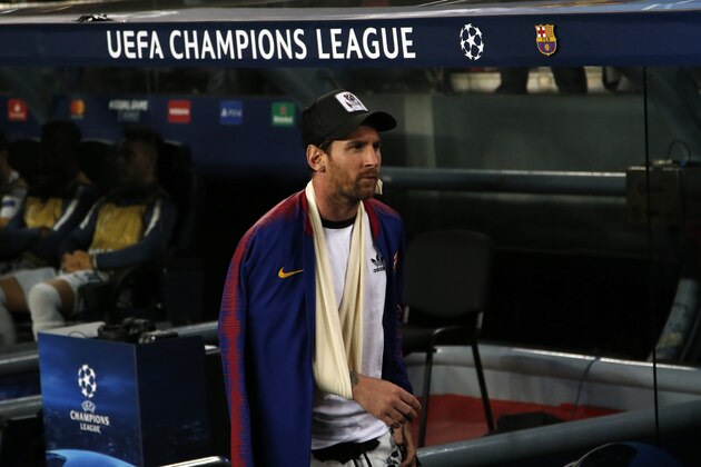 Barcelona forward Lionel Messi stands at the bench of his team prior to the Champions League, Group B soccer match between Barcelona and Inter Milan, at the Nou Camp in Barcelona, Spain, Wednesday, Oct. 24, 2018. (AP Photo/Emilio Morenatti)