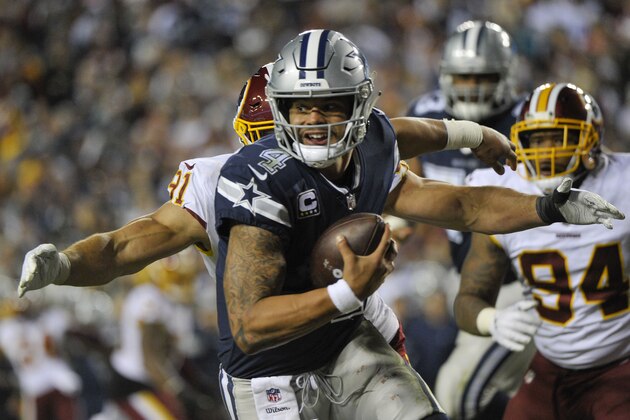 Washington Redskins linebacker Ryan Kerrigan (91) closes in on Dallas Cowboys quarterback Dak Prescott (4) forcing a fumble and a touchdown during the second half of an NFL football game, Sunday, Oct. 21, 2018 in Landover, Md. (AP Photo/Mark Tenally) Washington Redskins linebacker Ryan Kerrigan (91) closes in on Dallas Cowboys quarterback Dak Prescott (4) forcing a fumble and a touchdown during the second half of an NFL football game, Sunday, Oct. 21, 2018 in Landover, Md. (AP Photo/Mark Tenally)
