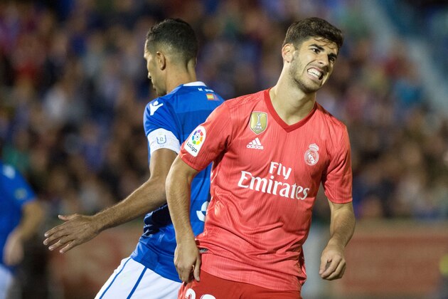Real Madrid's Spanish midfielder Marco Asensio grimaces during the Spanish King's Cup (Copa del Rey) football match between UD Melilla and Real Madrid CF at the Alvarez Claro municipal stadium in the autonomous city of Melilla on October 31, 2018. (Photo by JORGE GUERRERO / AFP)        (Photo credit should read JORGE GUERRERO/AFP/Getty Images)