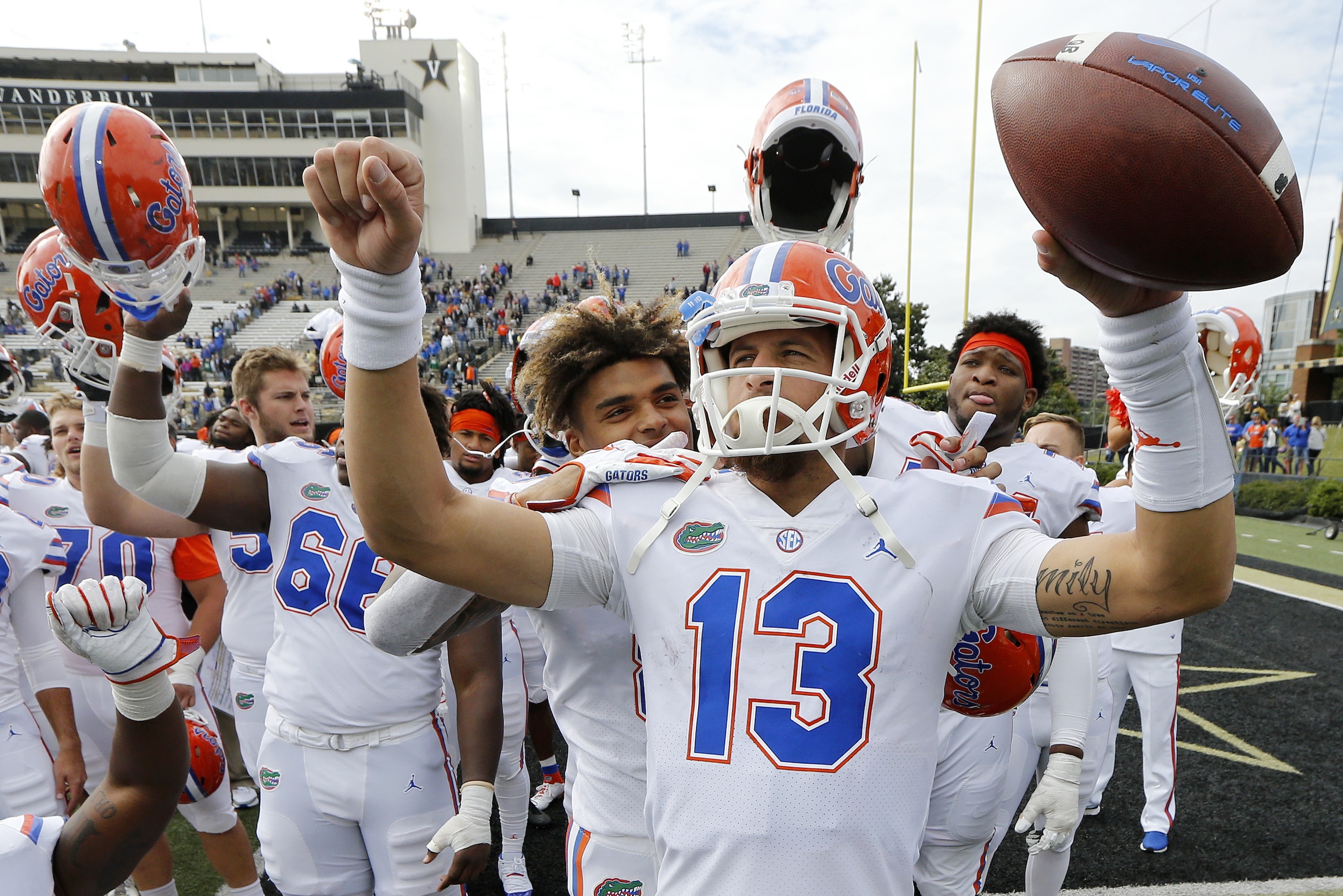 Florida quarterback Feleipe Franks (13) celebrates after the Gators defeated Vanderbilt 37-27 in an NCAA college football game Saturday, Oct. 13, 2018, in Nashville, Tenn. (AP Photo/Mark Humphrey)