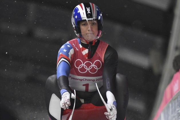 Erin Hamlin of the United States reacts after her first run in the women's luge at the Pyeongchang 2018 Winter Olympic Games in South Korea, Tuesday, Feb. 13, 2018. (Jonathan Hayward/The Canadian Press via AP)