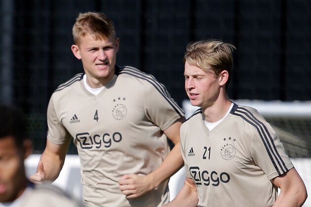 AMSTERDAM, NETHERLANDS - SEPTEMBER 18: (L-R) Carel Eiting of Ajax, Matthijs de Ligt of Ajax, Frenkie de Jong of Ajax  during the   Training Ajax at the De Toekomst on September 18, 2018 in Amsterdam Netherlands (Photo by Erwin Spek/Soccrates/Getty Images)