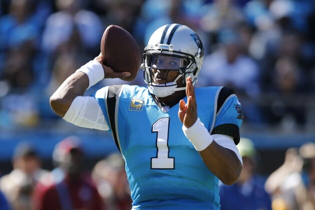 Carolina Panthers' Cam Newton (1) looks to pass against the Baltimore Ravens in the first half of an NFL football game in Charlotte, N.C., Sunday, Oct. 28, 2018. (AP Photo/Nell Redmond)