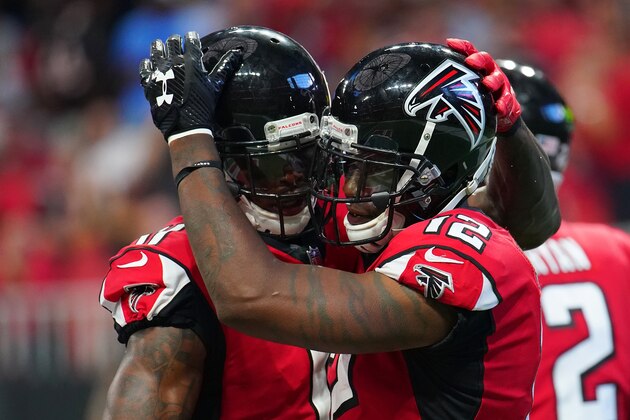 ATLANTA, GA - SEPTEMBER 23: Mohamed Sanu #12 celebrates a touchdown with Julio Jones #11 of the Atlanta Falcons during the second half against the New Orleans Saints at Mercedes-Benz Stadium on September 23, 2018 in Atlanta, Georgia. (Photo by Daniel Shirey/Getty Images)