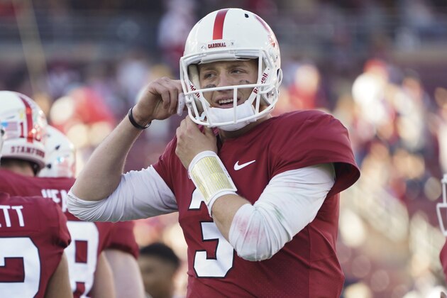 Stanford quarterback K.J. Costello adjusts his helmet in the first half against Washington State during an NCAA college football game on Saturday, Oct. 27, 2018, in Stanford, Calif. (AP Photo/Don Feria)