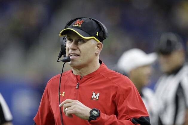 Maryland head coach DJ Durkin walks the sidelines during the first half of the Quick Lane Bowl NCAA college football game against Boston College, Monday, Dec. 26, 2016, in Detroit. (AP Photo/Carlos Osorio)
