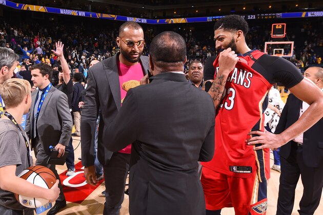 OAKLAND, CA - OCTOBER 31: DeMarcus Cousins #0 of the Golden State Warriors speaks to Head Coach Alvin Gentry and Anthony Davis #23 of the New Orleans Pelicans after the game on October 31, 2018 at ORACLE Arena in Oakland, California. NOTE TO USER: User expressly acknowledges and agrees that, by downloading and/or using this photograph, user is consenting to the terms and conditions of Getty Images License Agreement. Mandatory Copyright Notice: Copyright 2018 NBAE (Photo by Noah Graham/NBAE via Getty Images)