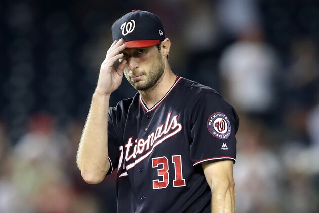 WASHINGTON, DC - SEPTEMBER 25: Starting pitcher Max Scherzer #31 of the Washington Nationals acknowledges the crowd after recording his 300th strikeout for the year against the Miami Marlins for the second out of the seventh inning at Nationals Park on September 25, 2018 in Washington, DC. (Photo by Rob Carr/Getty Images)