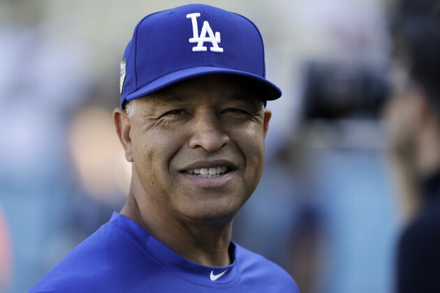 Los Angeles Dodgers manager Dave Roberts watches during batting practice before Game 4 of the World Series baseball game against the Boston Red Sox on Saturday, Oct. 27, 2018, in Los Angeles. (AP Photo/David J. Phillip)