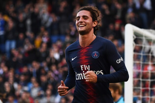 Paris Saint-Germain's French midfielder Adrien Rabiot celebrates after scoring his team's second goal during the French L1 football match between Paris Saint-Germain (PSG) and Amiens at the Parc des Princes stadium in Paris on October 20, 2018. (Photo by Anne-Christine POUJOULAT / AFP)        (Photo credit should read ANNE-CHRISTINE POUJOULAT/AFP/Getty Images)