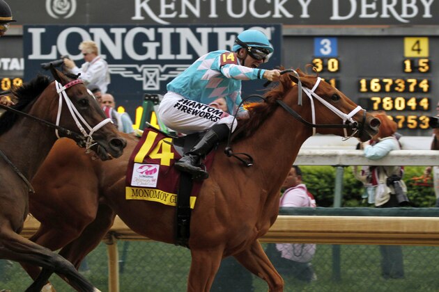 Florent Geroux rides Monomoy Girl to victory during the 144th running of the Kentucky Oaks horse race at Churchill Downs Friday, May 4, 2018, in Louisville, Ky. (AP Photo/Garry Jones)