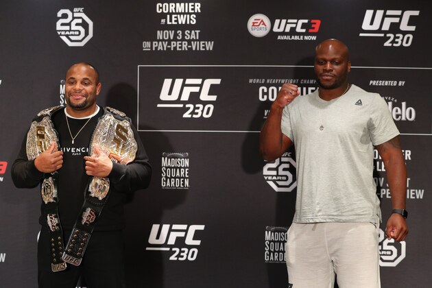 NEW YORK, NY - NOVEMBER 1: (L-R) UFC light heavyweight and heavyweight champion Daniel Cormier and Derrick Lewis pose for media during the UFC 230 ultimate media day at the New York Marriott Marquis on November 1, 2018 in New York, NY.  (Photo by Ed Mulholland/Zuffa LLC/Zuffa LLC via Getty Images)