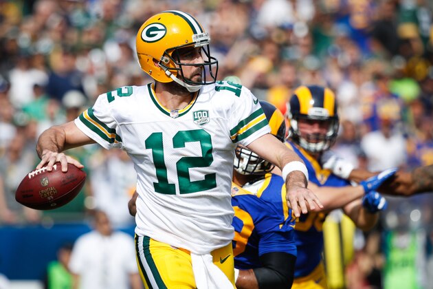 LOS ANGELES, CA - OCTOBER 28: Quarterback Aaron Rodgers #12 of the Green Bay Packers looks to make a pass in the first quarter against the Los Angeles Rams at Los Angeles Memorial Coliseum on October 28, 2018 in Los Angeles, California. (Photo by Joe Robbins/Getty Images)