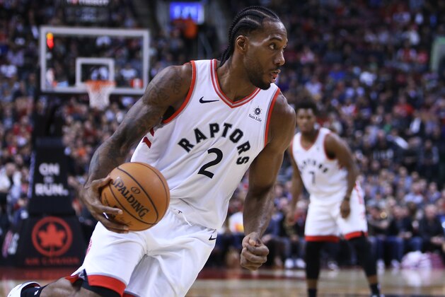 TORONTO, ON - OCTOBER 30:  Kawhi Leonard #2 of the Toronto Raptors dribbles the ball during the second half of an NBA game against the Philadelphia 76ers at Scotiabank Arena on October 30, 2018 in Toronto, Canada.  NOTE TO USER: User expressly acknowledges and agrees that, by downloading and or using this photograph, User is consenting to the terms and conditions of the Getty Images License Agreement.  (Photo by Vaughn Ridley/Getty Images)