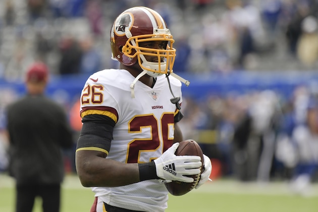 Washington Redskins running back Adrian Peterson (26) warms up before an NFL football game against the New York Giants, Sunday, Oct. 28, 2018, in East Rutherford, N.J. (AP Photo/Bill Kostroun)