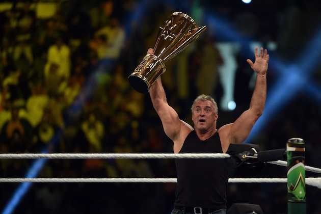 Shane McMahon, SmackDown commissioner and minority owner of WWE, raises the WWE World Cup trophy following the match as part of as part of the World Wrestling Entertainment (WWE) Crown Jewel pay-per-view at the King Saud University Stadium in Riyadh on November 2, 2018. (Photo by Fayez Nureldine / AFP)        (Photo credit should read FAYEZ NURELDINE/AFP/Getty Images)