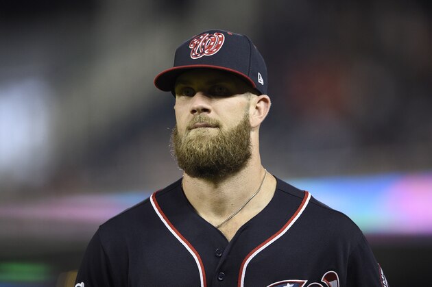 Washington Nationals' Bryce Harper stands on the field during a baseball game against the New York Mets, Friday, Sept. 21, 2018, in Washington. The Mets won 4-2. (AP Photo/Nick Wass)