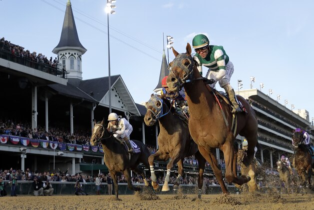 Joel Rosario rides Accelerate to victory in the Breeders' Cup Classic horse race at Churchill Downs, Saturday, Nov. 3, 2018, in Louisville, Ky. (AP Photo/Darron Cummings)