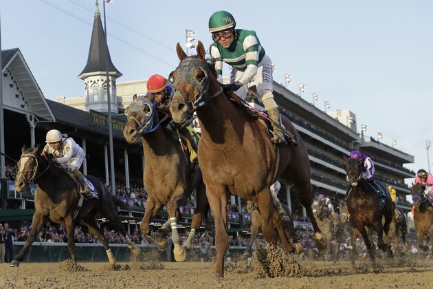 Joel Rosario rides Accelerate to victory in the Breeders' Cup Classic horse race at Churchill Downs, Saturday, Nov. 3, 2018, in Louisville, Ky. (AP Photo/Darron Cummings)