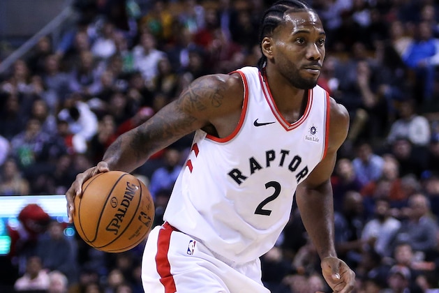 TORONTO, ON - OCTOBER 30:  Kawhi Leonard #2 of the Toronto Raptors dribbles the ball during the second half of an NBA game against the Philadelphia 76ers at Scotiabank Arena on October 30, 2018 in Toronto, Canada.  NOTE TO USER: User expressly acknowledges and agrees that, by downloading and or using this photograph, User is consenting to the terms and conditions of the Getty Images License Agreement.  (Photo by Vaughn Ridley/Getty Images)