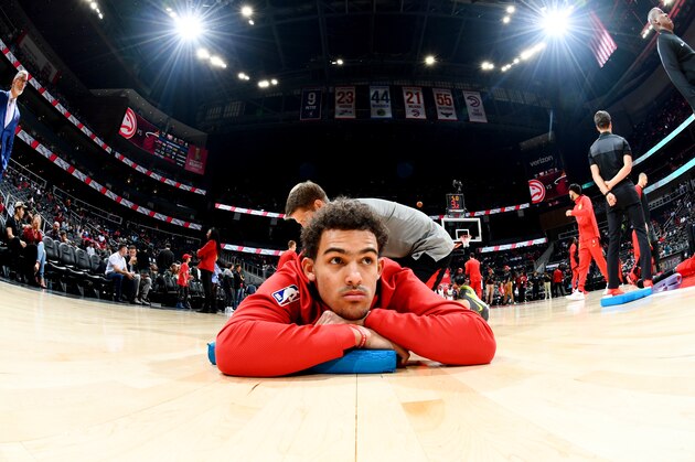 ATLANTA, GA - NOVEMBER 3: Trae Young #11 of the Atlanta Hawks stretches prior to the game against the Miami Heat on November 3, 2018 at Philips Arena in Atlanta, Georgia.  NOTE TO USER: User expressly acknowledges and agrees that, by downloading and/or using this Photograph, user is consenting to the terms and conditions of the Getty Images License Agreement. Mandatory Copyright Notice: Copyright 2018 NBAE (Photo by Scott Cunningham/NBAE via Getty Images)