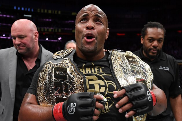 NEW YORK, NY - NOVEMBER 03:  Daniel Cormier celebrates after his submission victory over Derrick Lewis in their UFC heavyweight championship bout during the UFC 230 event inside Madison Square Garden on November 3, 2018 in New York, New York. (Photo by Jeff Bottari/Zuffa LLC/Zuffa LLC via Getty Images)