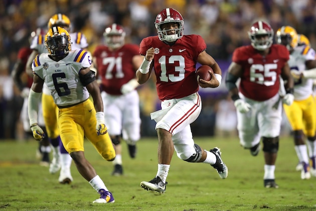 BATON ROUGE, LA - NOVEMBER 03:  Tua Tagovailoa #13 of the Alabama Crimson Tide runs for a third quarter touchdown while playing the LSU Tigers at Tiger Stadium on November 3, 2018 in Baton Rouge, Louisiana. Alabama won the game 29-0. (Photo by Gregory Shamus/Getty Images)