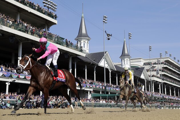 Javier Castellano, left, rides City of Light to victory in the during the Breeders' Cup Dirt Mile horse race at Churchill Downs, Saturday, Nov. 3, 2018, in Louisville, Ky. (AP Photo/Darron Cummings)