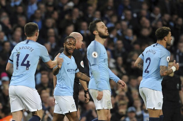 Manchester City's Raheem Sterling, second left, celebrates with teammates after scoring his side's fifth goal during the English Premier League soccer match between Manchester City and Southampton at Etihad stadium in Manchester, England, Sunday, Nov. 4, 2018. (AP Photo/Rui Vieira)