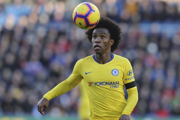 Chelsea's Willian looks to control the ball during the English Premier League soccer match between Burnley and Chelsea at Turf Moor stadium in Burnley, England, Sunday, Oct. 28, 2018. (AP Photo/Rui Vieira)