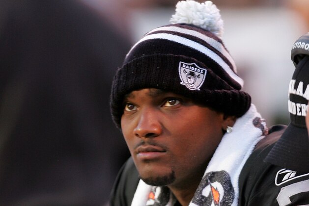 OAKLAND, CA - NOVEMBER 15:  JaMarcus Russell #2 of the Oakland Raiders sits on the bench after being taken out of their game against the Kansas City Chiefs at Oakland-Alameda County Coliseum on November 15, 2009 in Oakland, California.  (Photo by Ezra Shaw/Getty Images)