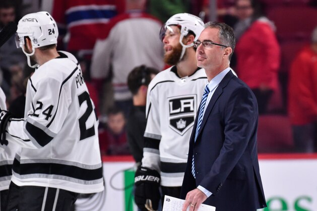 MONTREAL, QC - OCTOBER 26:  Head coach of the Los Angeles Kings John Stevens walks past his team celebrating against the Montreal Canadiens during the NHL game at the Bell Centre on October 26, 2017 in Montreal, Quebec, Canada.  The Los Angeles Kings defeated the Montreal Canadiens 4-0.  (Photo by Minas Panagiotakis/Getty Images)