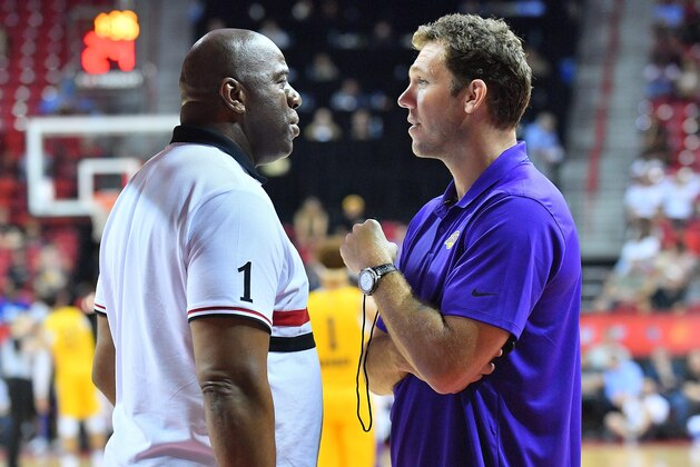 LAS VEGAS, NV - JULY 10:  Head coach Luke Walton of the Los Angeles Lakers talks with Los Angeles Lakers president of basketball operations Earvin 'Magic' Johnson during the 2018 NBA Summer League at the Thomas & Mack Center on July 10, 2018 in Las Vegas, Nevada. The Lakers defeated the Knicks 109-92. NOTE TO USER: User expressly acknowledges and agrees that, by downloading and or using this photograph, User is consenting to the terms and conditions of the Getty Images License Agreement.  (Photo by Sam Wasson/Getty Images)