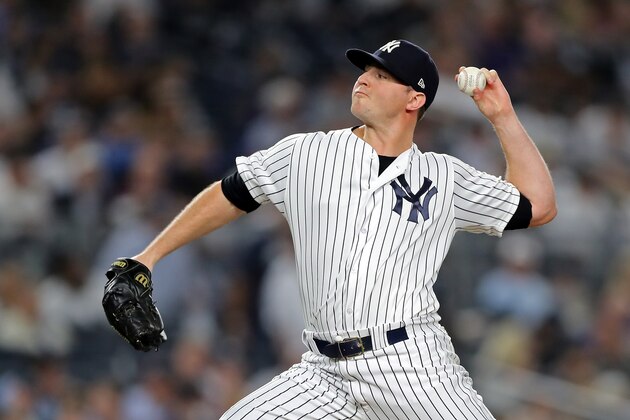 NEW YORK, NEW YORK - OCTOBER 09:  Zach Britton #53 of the New York Yankees pitches in the fourth inning against the Boston Red Sox during Game Four American League Division Series at Yankee Stadium on October 09, 2018 in the Bronx borough of New York City. (Photo by Elsa/Getty Images)