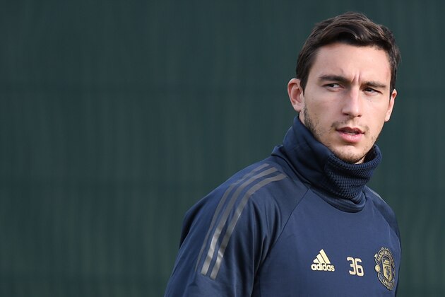 Manchester United's Italian defender Matteo Darmian arrives for a training session at the Carrington Training complex in Manchester, north west England on October 22, 2018, ahead of their UEFA Champions League group H football match against Juventus on October 23. (Photo by Oli SCARFF / AFP)        (Photo credit should read OLI SCARFF/AFP/Getty Images)