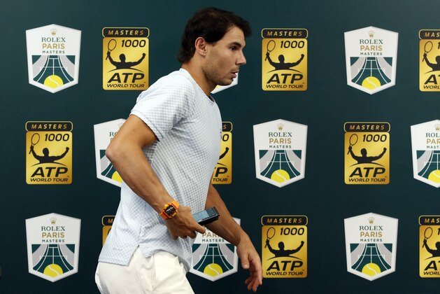 Rafael Nadal of Spain leaves after press conference to announce his withdraw from the Paris Masters tennis tournament at the Bercy Arena in Paris, France, Wednesday, Oct. 31, 2018. (AP Photo/Christophe Ena) Rafael Nadal of Spain leaves after press conference to announce his withdraw from the Paris Masters tennis tournament at the Bercy Arena in Paris, France, Wednesday, Oct. 31, 2018. (AP Photo/Christophe Ena)