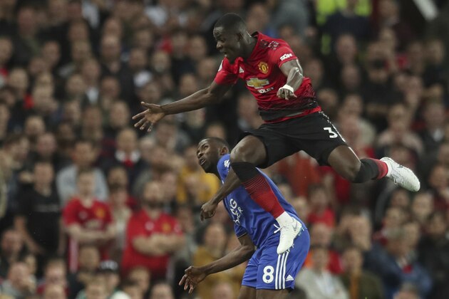 Manchester United's Eric Bailly, top leaps to head the ball as Leicester City's Kelechi Iheanacho look up during the English Premier League soccer match between Manchester United and Leicester City at Old Trafford, in Manchester, England, Friday, Aug. 10, 2018. (AP Photo/Jon Super) Manchester United's Eric Bailly, top leaps to head the ball as Leicester City's Kelechi Iheanacho look up during the English Premier League soccer match between Manchester United and Leicester City at Old Trafford, in Manchester, England, Friday, Aug. 10, 2018. (AP Photo/Jon Super)