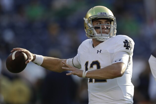 Notre Dame quarterback Ian Book warms up before facing Navy in an NCAA college football game Saturday, Oct. 27, 2018, in San Diego. (AP Photo/Gregory Bull)