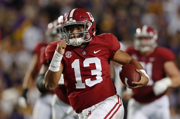 Alabama quarterback Tua Tagovailoa (13) rushes on a 44 yard touchdown carry in the second half of an NCAA college football game in Baton Rouge, La., Saturday, Nov. 3, 2018. Alabama won 29-0. (AP Photo/Gerald Herbert)