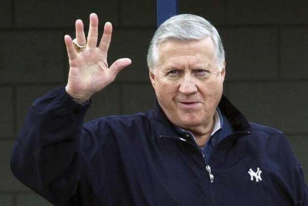FILE - In this Feb. 17, 2004, file photo, New York Yankees owner George Steinbrenner waves to fans in Tampa, Fla. Steinbrenner, former managers Lou Piniella, Davey Johnson and Charlie Manuel, and six players headed by Lee Smith are on the 10-man ballot for the baseball Hall of Fame's today's game era committee to consider Dec. 9, 2018. (AP Photo/Chris O'Meara, File)