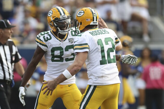 Green Bay Packers wide receiver Marquez Valdes-Scantling (83) smiles as he greets Green Bay Packers quarterback Aaron Rodgers (12) following his touchdown celebration in the second half of an NFL football game, Sunday, Oct. 28, 2018, in Los Angeles. (AP Photo/Peter Joneleit) of an NFL football game, Sunday, Oct. 28, 2018, in Los Angeles. (AP Photo/Peter Joneleit)